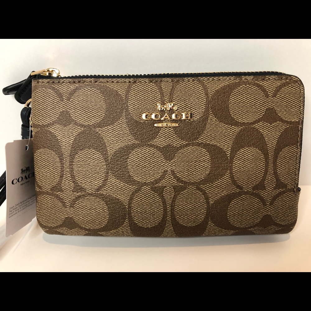 ****SOLD****Signature Coach wristlet in canvas